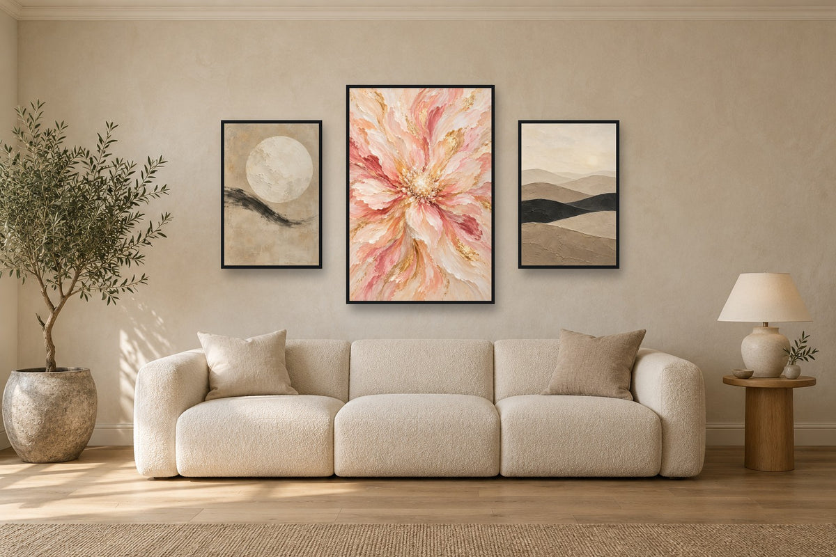 Three Canvalora artworks hung above a sofa